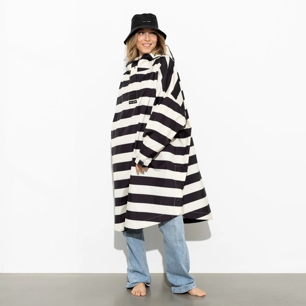 Raincoat bold stripes - black/sand