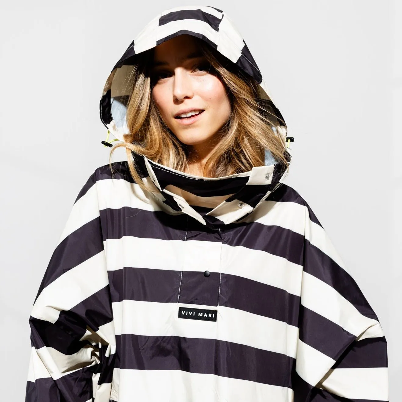 Raincoat bold stripes - black/sand