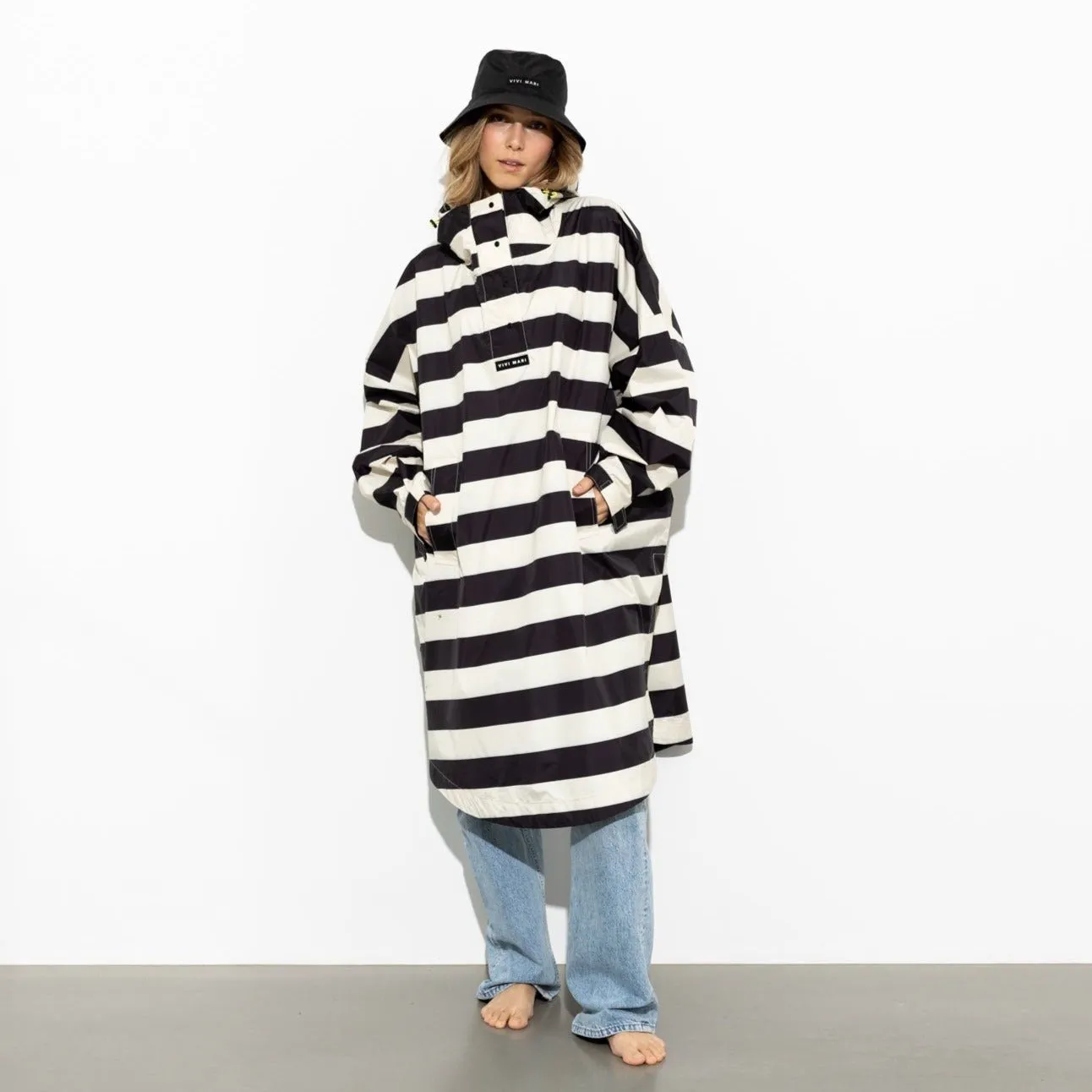 Raincoat bold stripes - black/sand